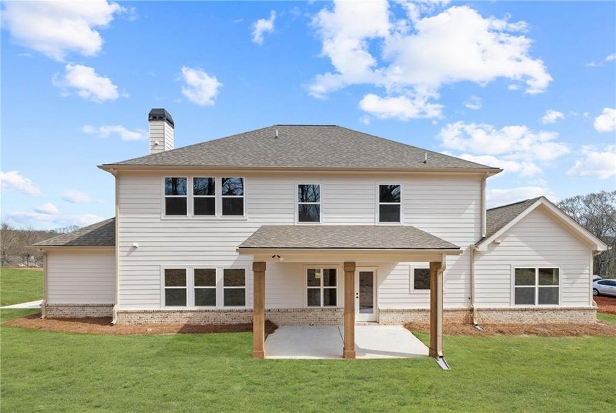 Front exterior of a new home in , Hoschton, GA, highlighting curb appeal (Image 23).