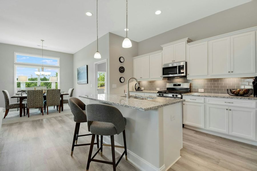 Representative furnished interior of a home built from the The Everleigh by Windsong Properties in Madeira, Acworth (Image 19).
