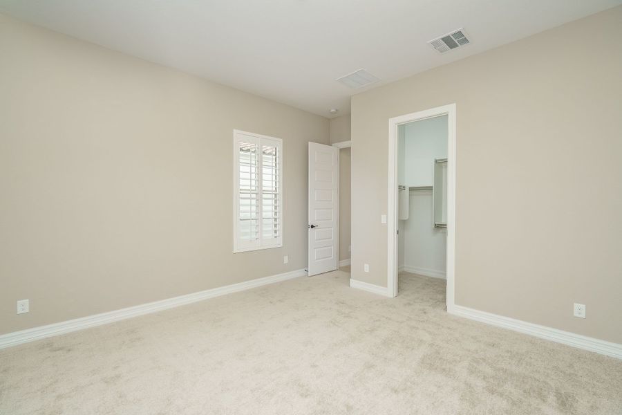 Spacious, unfurnished interior of a new home in Harmony at Montecito in Estrella, Goodyear (Image 39).