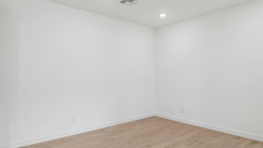 Representative unfurnished interior of a home built from the Phoenician by D.R. Horton in The Ridge at Stone Butte, Phoenix (Image 23).