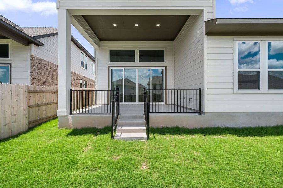 Exterior details and patio area of a home in Lariat, Liberty Hill (Image 25). Exterior details and patio area of a home in Lariat, Liberty Hill (Image 25).