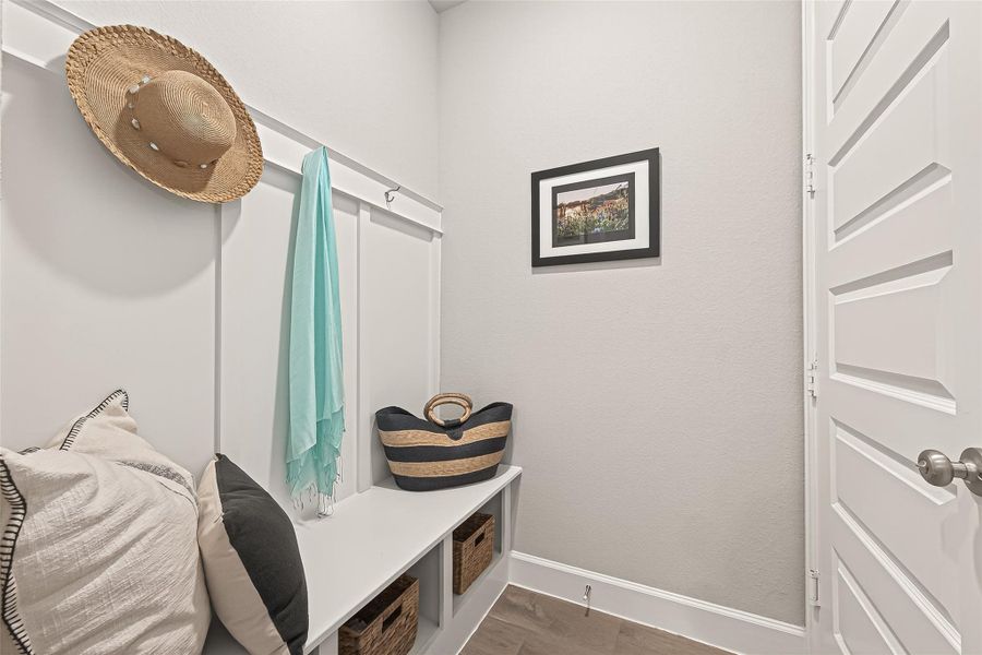 This charming and practical mudroom offers a perfect blend of style and organized storage, keeping your home tidy and welcoming. (Note: Photo is staged; property is currently vacant.) This charming and practical mudroom offers a perfect blend of style and organized storage, keeping your home tidy and welcoming. (Note: Photo is staged; property is currently vacant.)