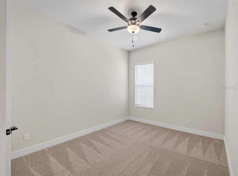 Spacious, unfurnished interior of a new home in Stables at Cary Forest, Bryceville (Image 30).