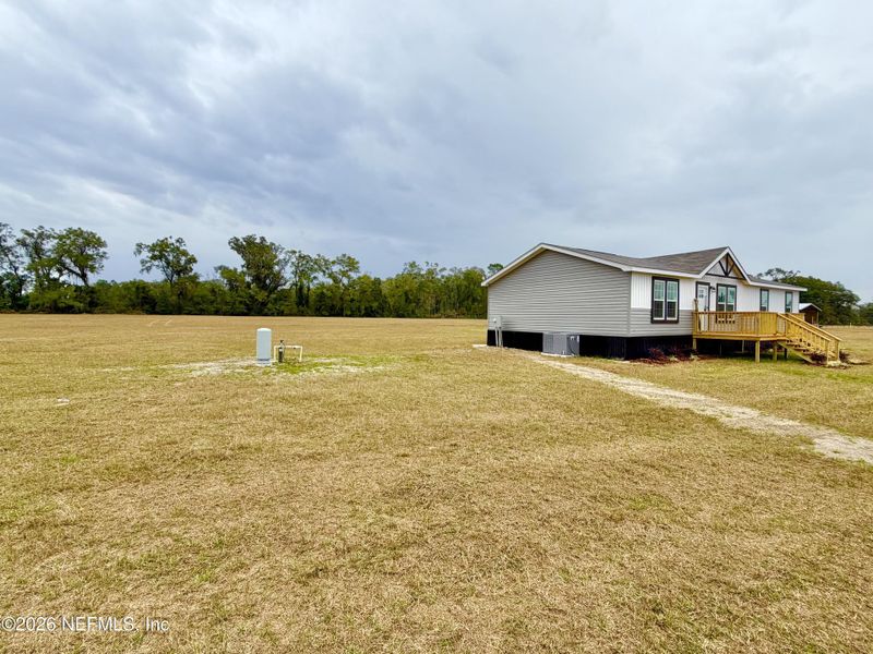 Exterior details and patio area of a home in , Brooker (Image 21).
