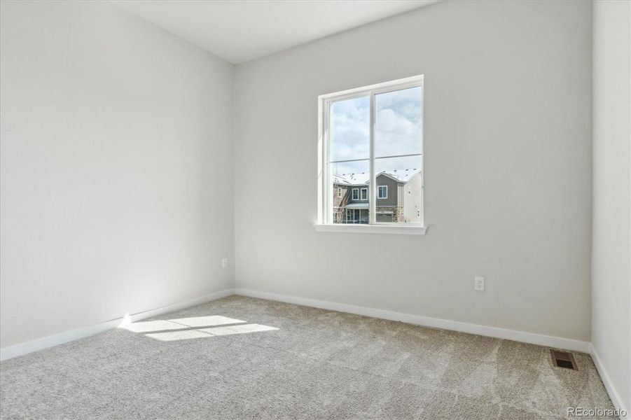 Spacious, unfurnished interior of a new home in Trails at Smoky Hill, Parker (Image 12).