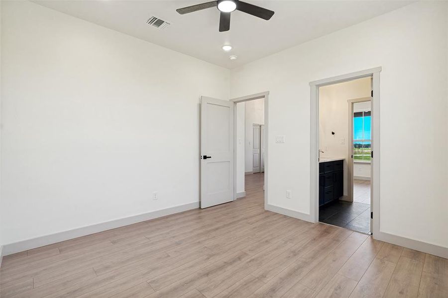Bedroom 3 featuring wood-finish flooring, recessed lighting, and a ceiling fan