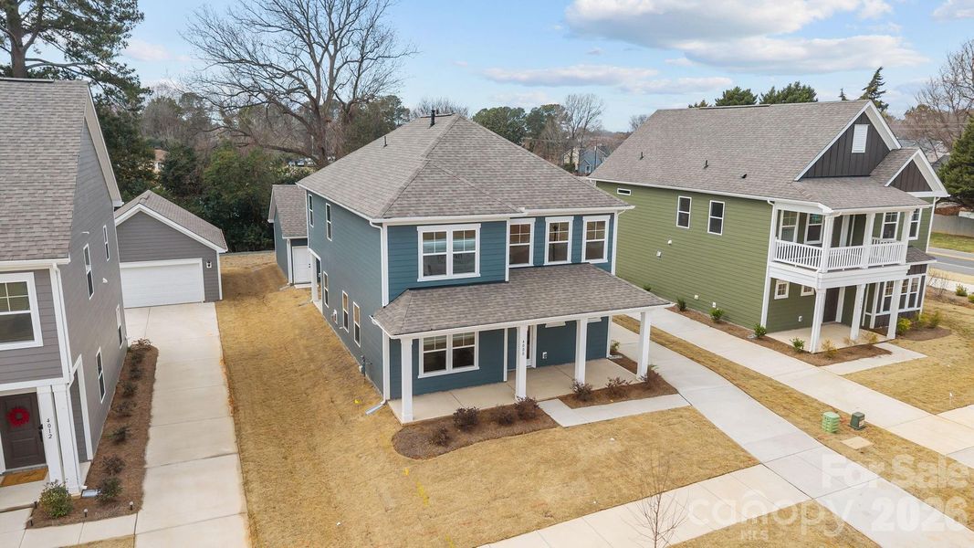 Front exterior of a new home in Arbor Village, Matthews, NC, highlighting curb appeal (Image 20).