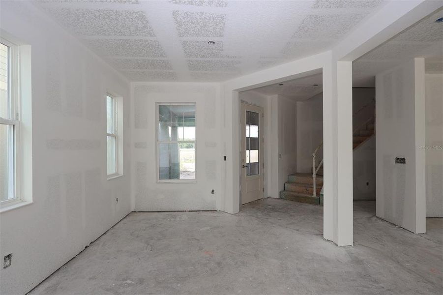 In-progress construction of a new home in Center Lake on the Park, St. Cloud, FL (Image 12).