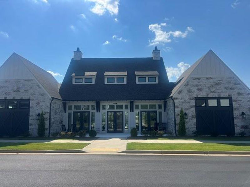 Front exterior of a new home in Promenade at Sawnee Village, Cumming, GA, highlighting curb appeal (Image 14).