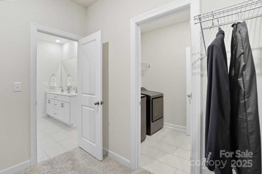 Primary connects to large closet and laundry Primary connects to large closet and laundry