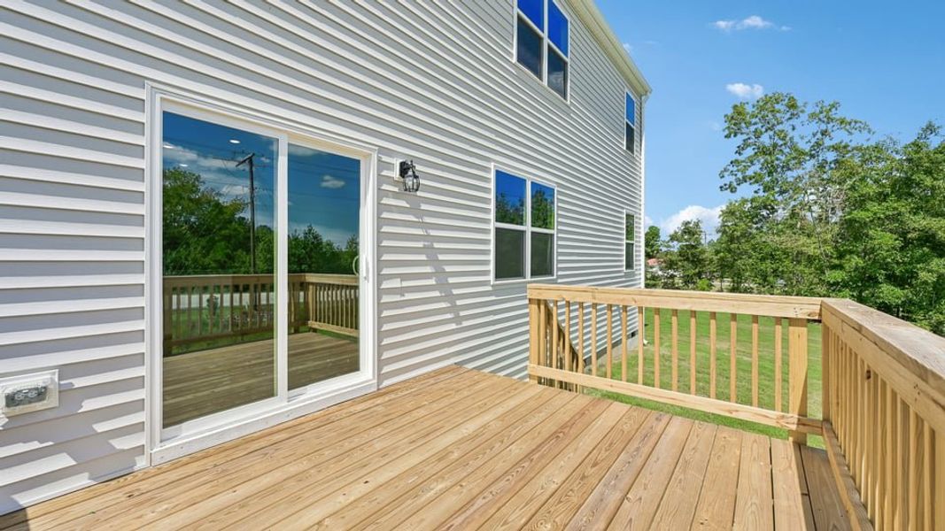 Exterior details and patio area of a home in Mason Ridge, Spring Lake (Image 3).