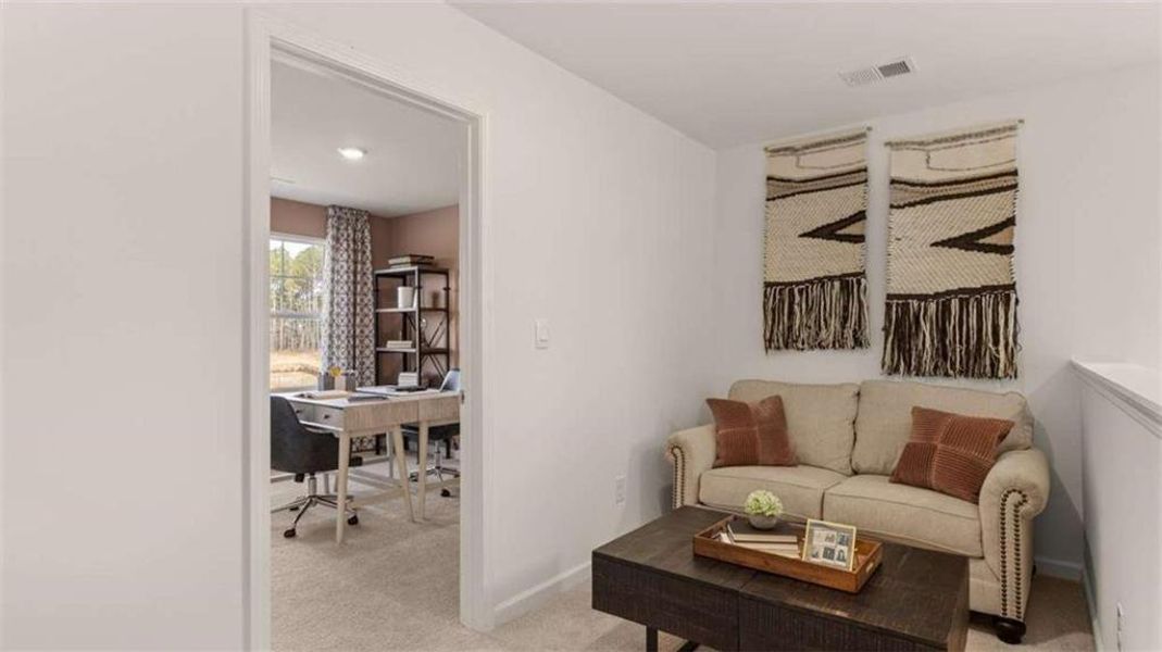 Furnished interior view inside a new home in Oakchase at Hampton, Hampton (Image 24).