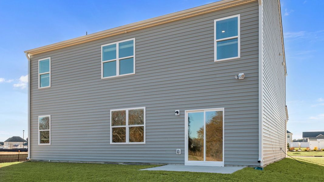 Exterior details and patio area of a home in Villa Grande, Winterville (Image 23).