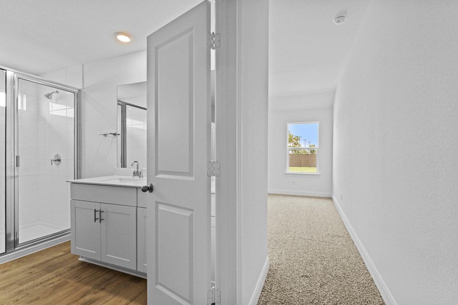Furnished interior view inside a new home in Railhead, Cedar Creek (Image 11).