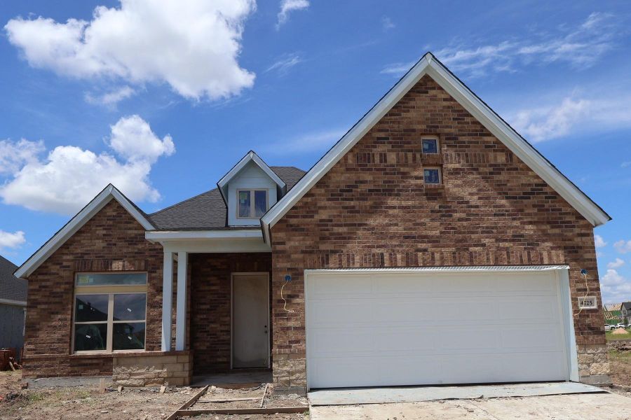 Front exterior of a new home in , Texas City, TX, highlighting curb appeal (Image 2). Front exterior of a new home in , Texas City, TX, highlighting curb appeal (Image 2).