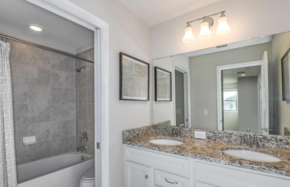 Image 12 representing the Castaway - End by Pulte Homes in Windsor Island Resort, Davenport, FL.