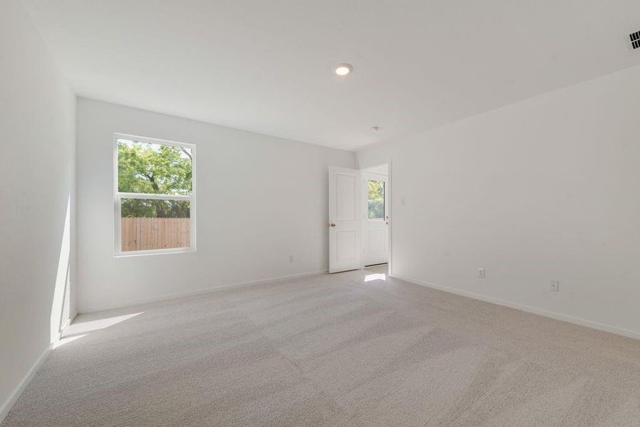 Unfurnished room with carpet flooring and recessed lighting