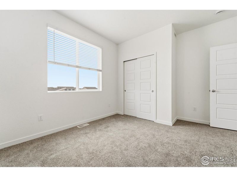 Spacious, unfurnished interior of a new home in Liberty Draw, Evans (Image 13).