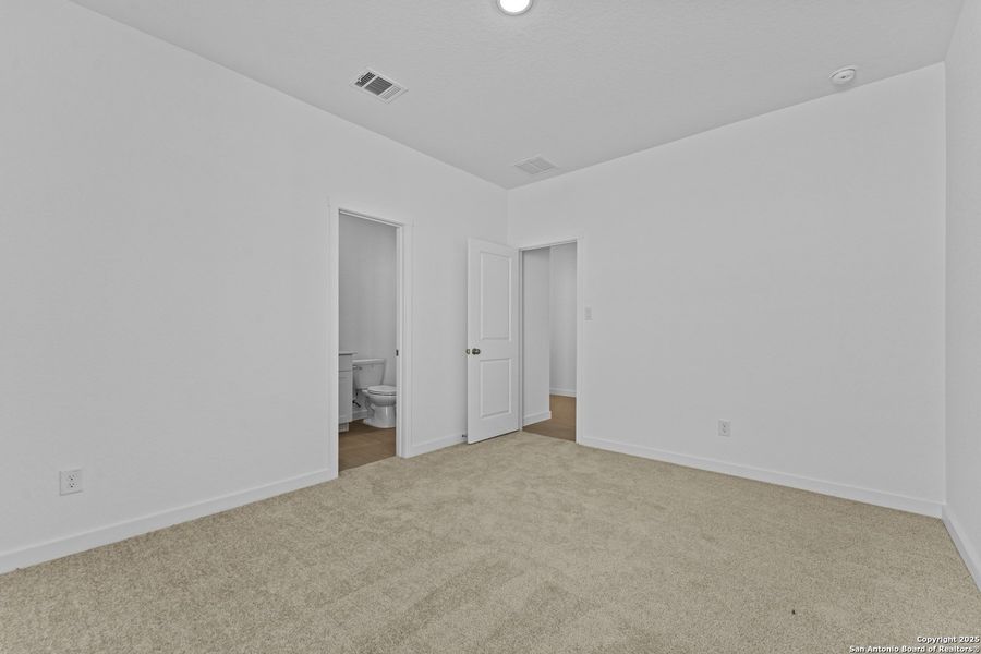 Spacious, unfurnished interior of a new home in Waterwheel: Coastline Collection, San Antonio (Image 17).