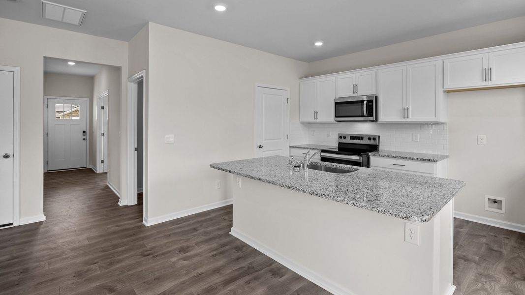 Furnished interior view inside a new home in Tyler - Home on the Lake, New Bern (Image 3).
