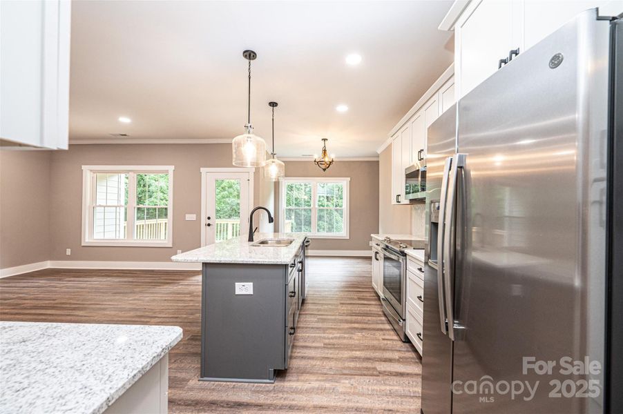 Furnished interior view inside a new home in , Lenoir (Image 13).
