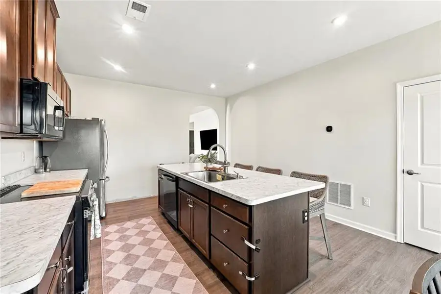 Furnished interior view inside a new home in , Hoschton (Image 22).