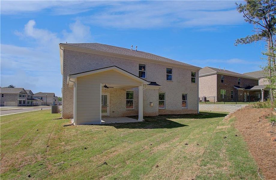 Exterior details and patio area of a home in Northcroft, Loganville (Image 21).
