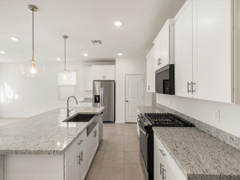 Furnished interior view inside a new home in Anthem at Merrill Ranch Estate Series, Florence (Image 3). Furnished interior view inside a new home in Anthem at Merrill Ranch Estate Series, Florence (Image 3).