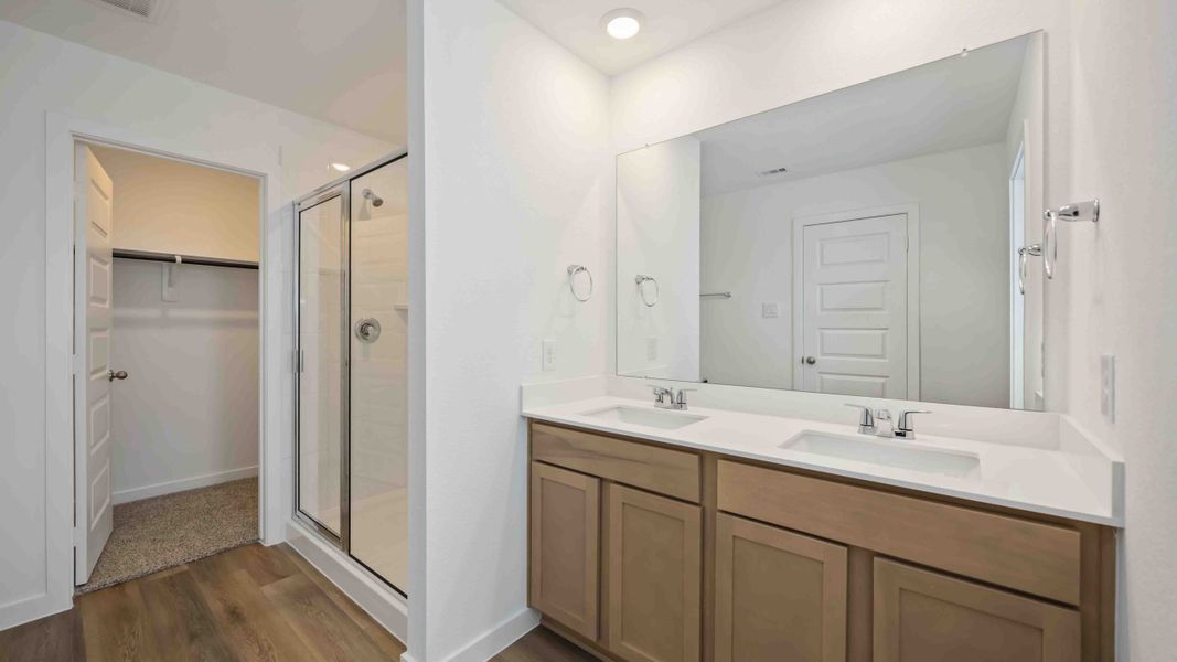 Furnished interior view inside a new home in Grand West, Houston (Image 8).