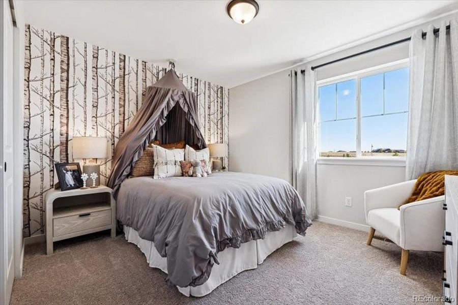 Furnished interior view inside a new home in Sweetgrass, Dacono (Image 12).