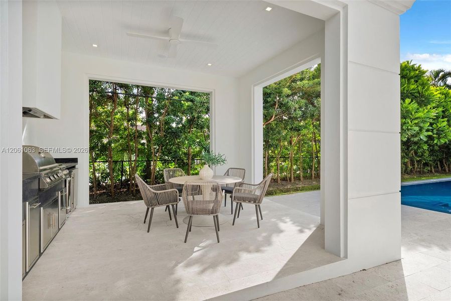 Exterior details and patio area of a home in , Coral Gables (Image 40).