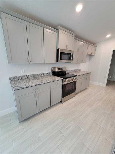 Furnished interior view inside a new home in Ocala Crossings South, Ocala (Image 6).