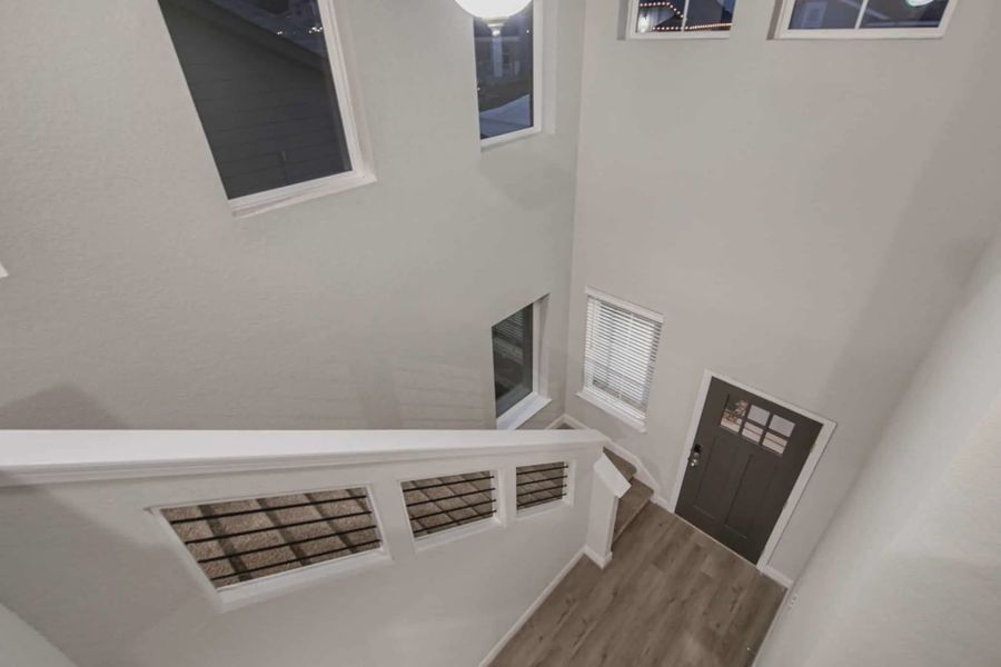 Representative unfurnished interior of a home built from the Portofino by Chesmar Homes in Sunterra, Katy (Image 8). Representative unfurnished interior of a home built from the Portofino by Chesmar Homes in Sunterra, Katy (Image 8).