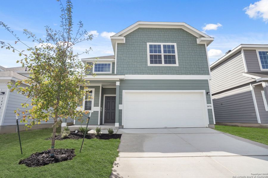 Front exterior of a new home in Timber Creek, San Antonio, TX, highlighting curb appeal (Image 1). Front exterior of a new home in Timber Creek, San Antonio, TX, highlighting curb appeal (Image 1).