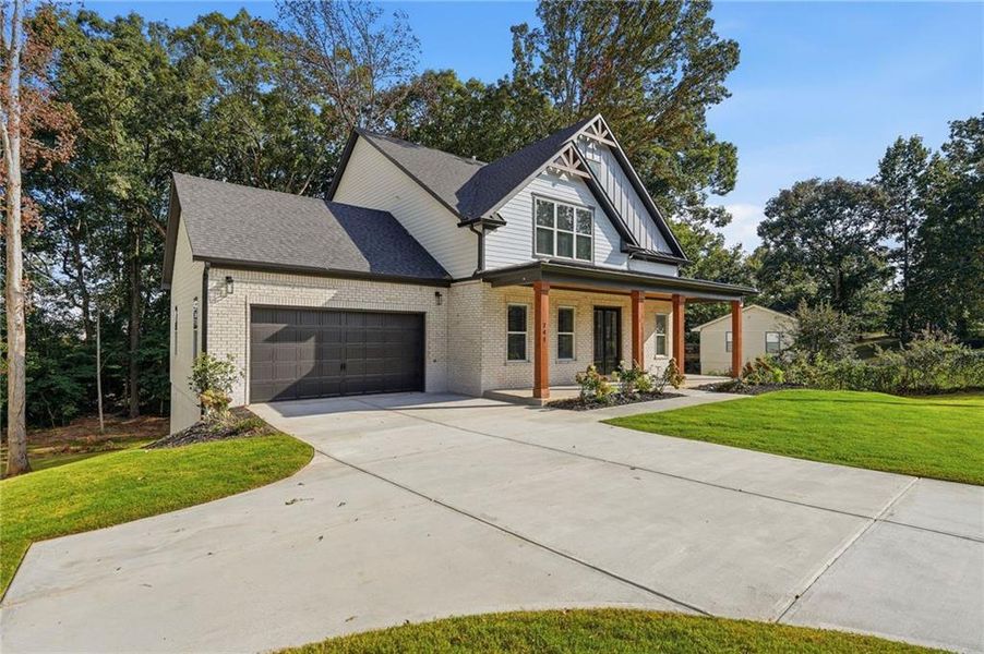 Front exterior of a new home in , Buford, GA, highlighting curb appeal (Image 25).