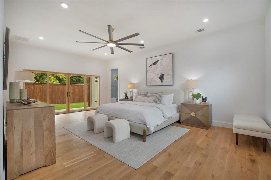 Bedroom with access to outside, recessed lighting, light wood finished floors, baseboards, and a ceiling fan Bedroom with access to outside, recessed lighting, light wood finished floors, baseboards, and a ceiling fan