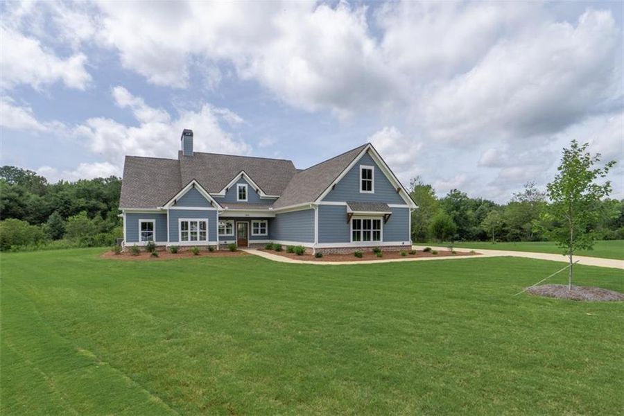 Front exterior of a new home in , Social Circle, GA, highlighting curb appeal (Image 28).