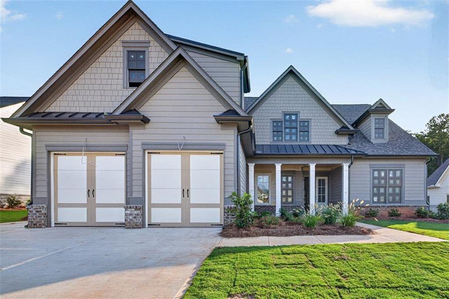 Front exterior of a new home in , Statham, GA, highlighting curb appeal (Image 2). Front exterior of a new home in , Statham, GA, highlighting curb appeal (Image 2).