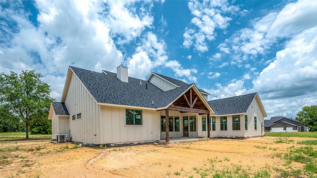 Front exterior of a new home in , Montgomery, TX, highlighting curb appeal (Image 27). Front exterior of a new home in , Montgomery, TX, highlighting curb appeal (Image 27).