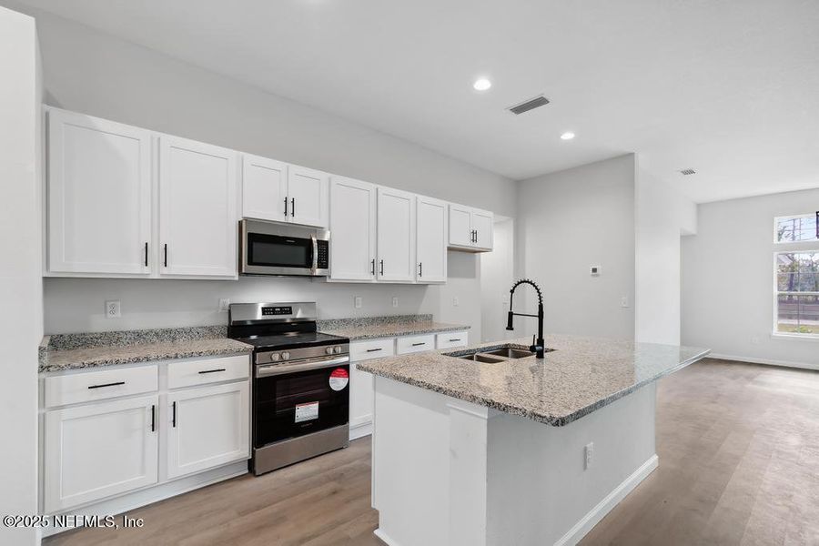 Furnished interior view inside a new home in , Jacksonville (Image 8).