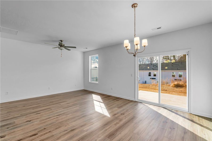 This airy space features durable flooring and ampl