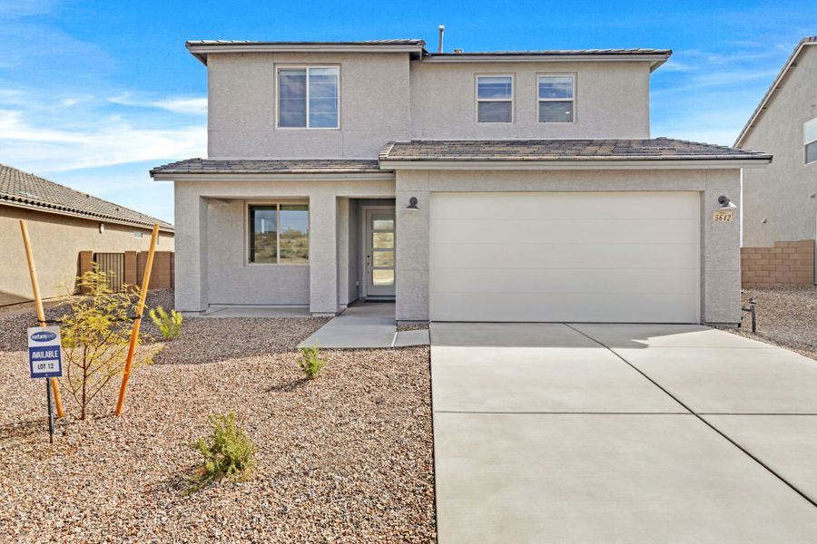 Front exterior of a new home in Silverbell Ridge, Marana, AZ, highlighting curb appeal (Image 1). Front exterior of a new home in Silverbell Ridge, Marana, AZ, highlighting curb appeal (Image 1).
