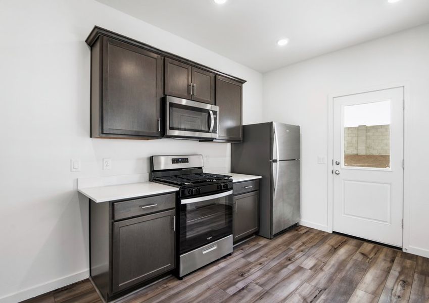 Representative furnished interior of a home built from the Aspen by LGI Homes in Star Valley, Tucson (Image 4).