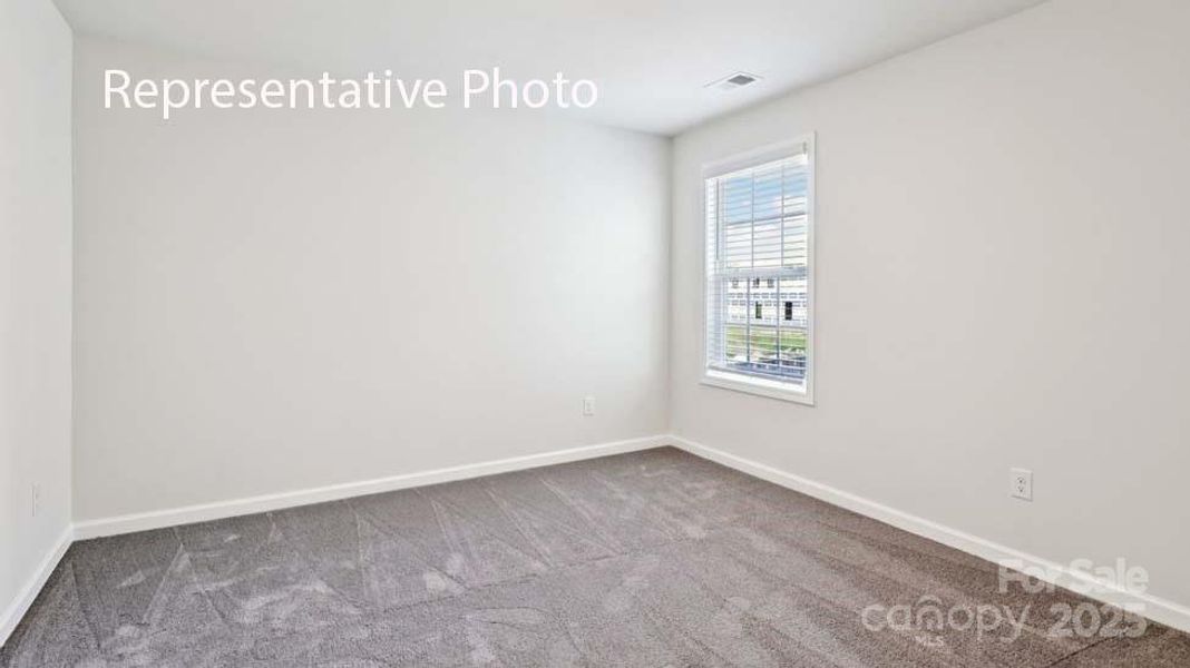 Spacious, unfurnished interior of a new home in Sanctuary at Southgate, Indian Trail (Image 25).