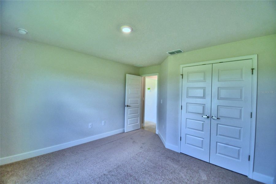 Spacious, unfurnished interior of a new home in Cadence Crossing, Auburndale (Image 28).