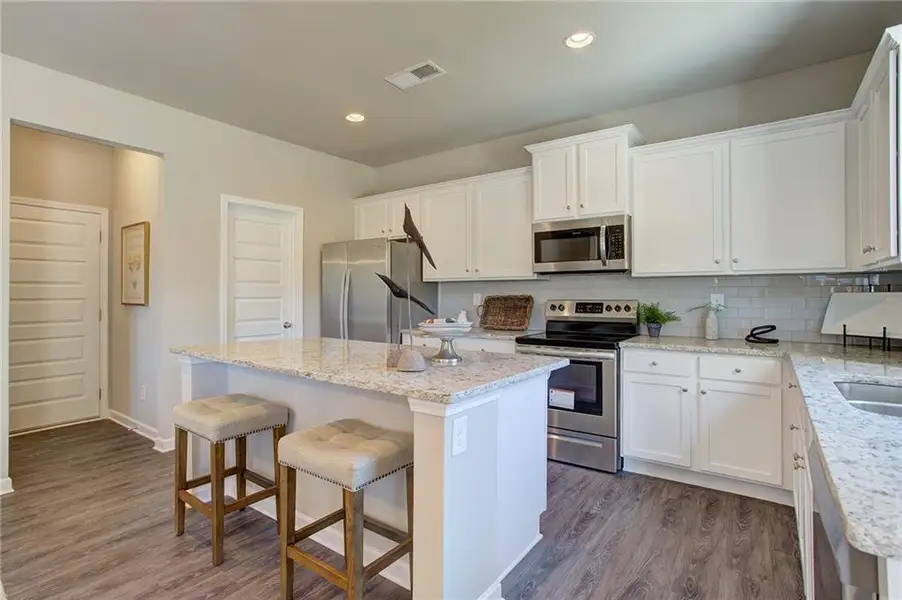 Furnished interior view inside a new home in Sutton’s Landing, Statham (Image 5).