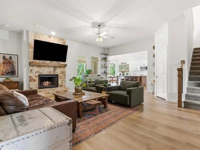 Spacious living area flowing seamlessly into kitchen and dining spaces for functional open layout.