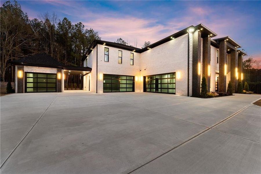 Front exterior of a new home in , Hoschton, GA, highlighting curb appeal (Image 37).