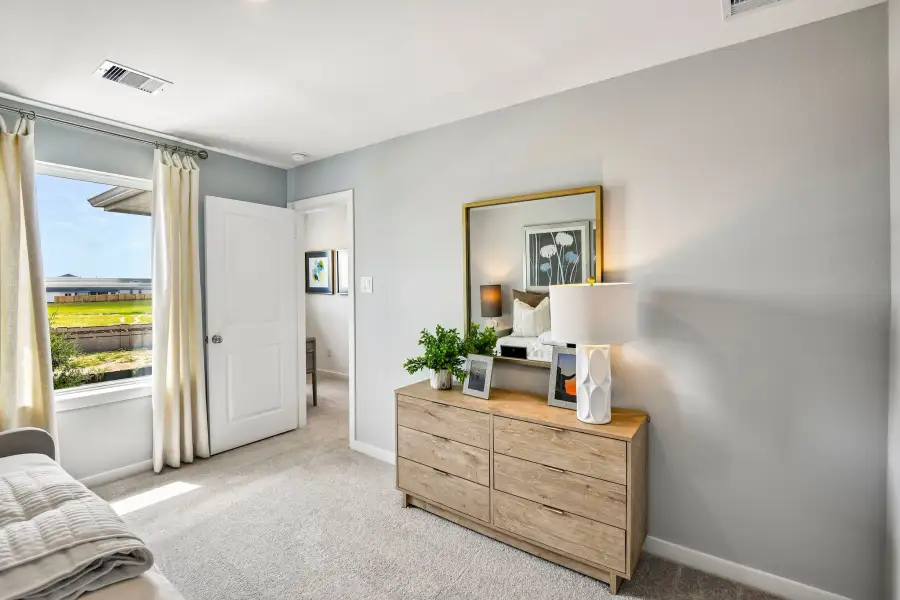 Furnished interior view inside a new home in Mason Woods, Cypress (Image 39).
