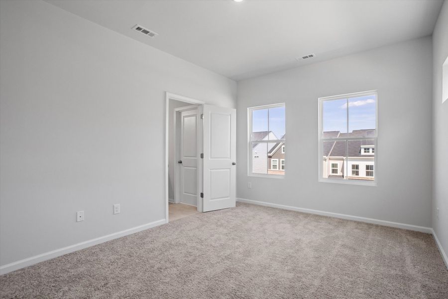 Spacious, unfurnished interior of a new home in Renaissance at White Oak, Garner (Image 19).